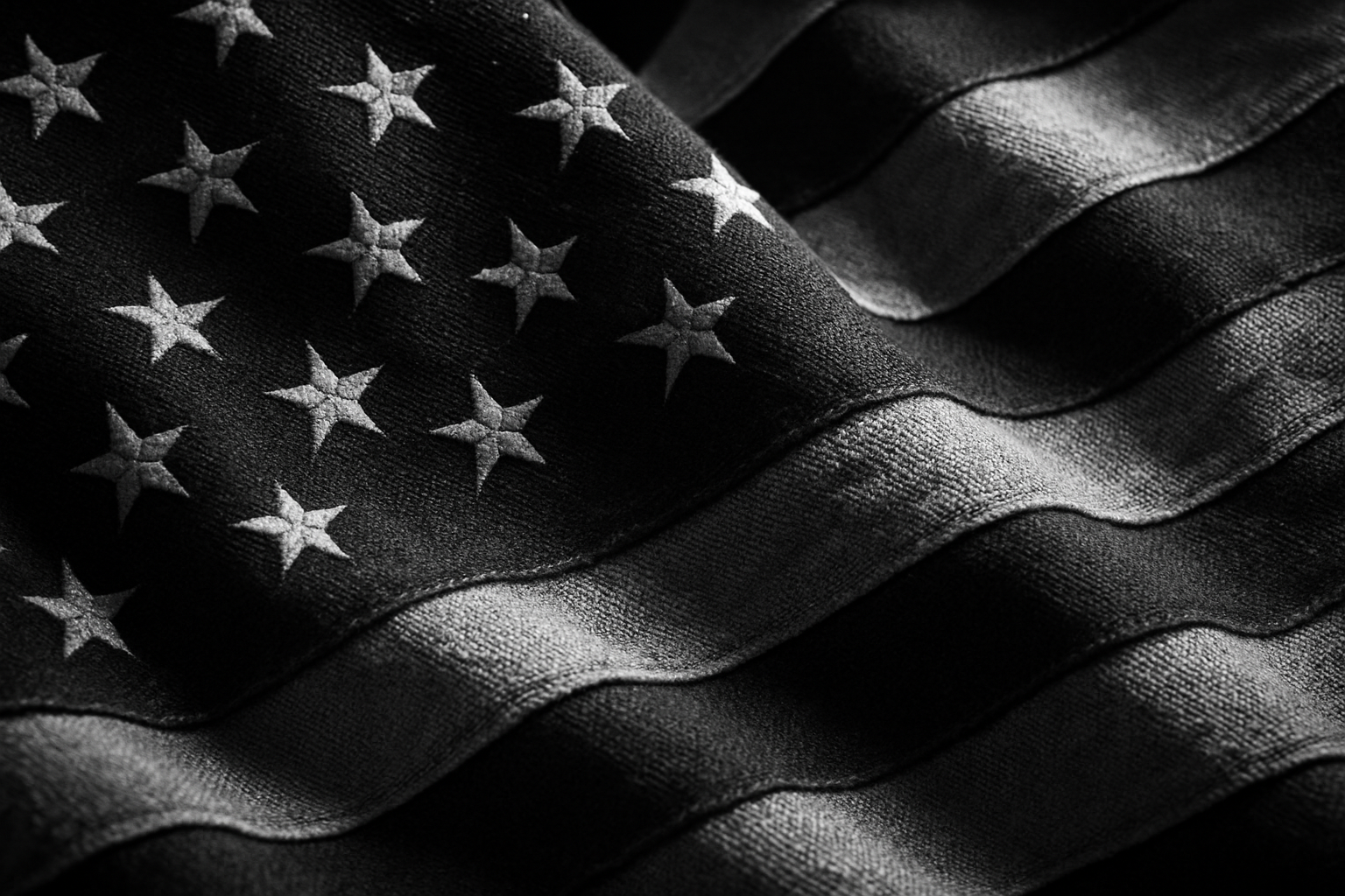 BLACK AND WHITE SHOT OF AMERICAN FLAG CLOSE UP